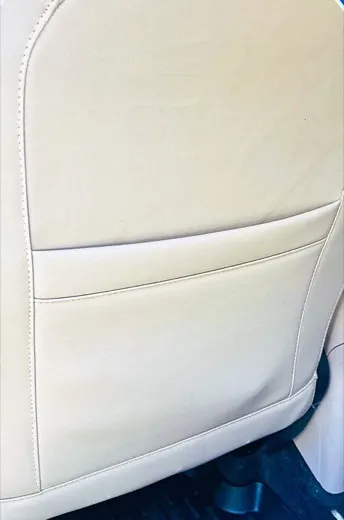 Sofa seat with a grubby darkened surface before cleaning, and the same seat cleaned and brightened